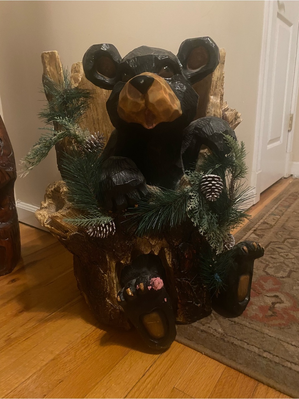 Kirklands Black and Brown Woodland Bear with Pine and Pinecone Accents
